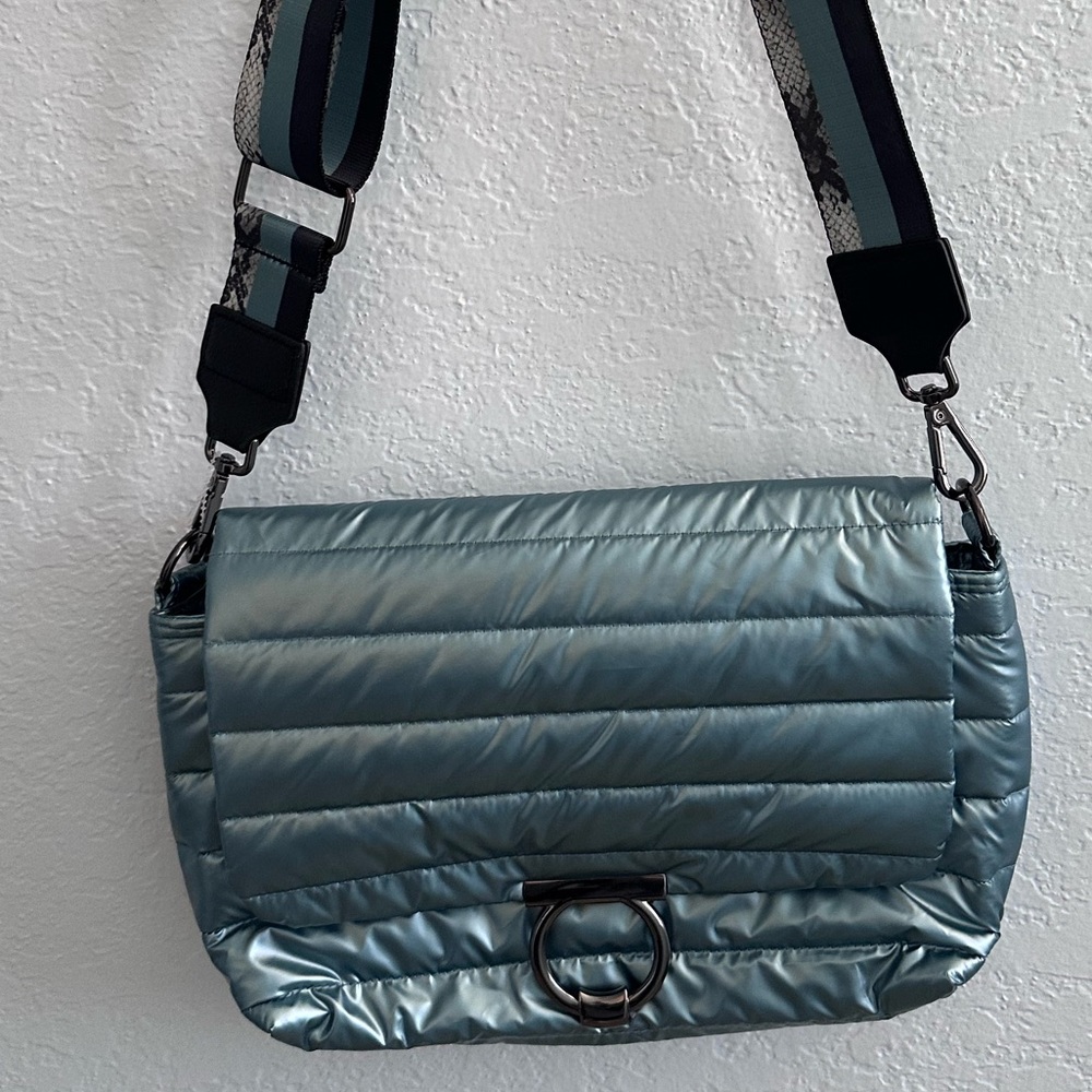 **Rare Find**
Think Rolyn Bag
Pearl ice blue